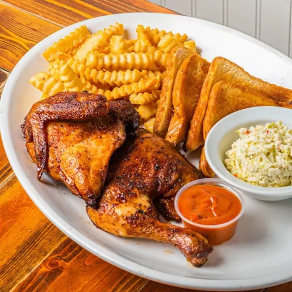 Barnes Restaurant's BBQ chicken platter with crinkle fries, toast, coleslaw, and dipping sauce.